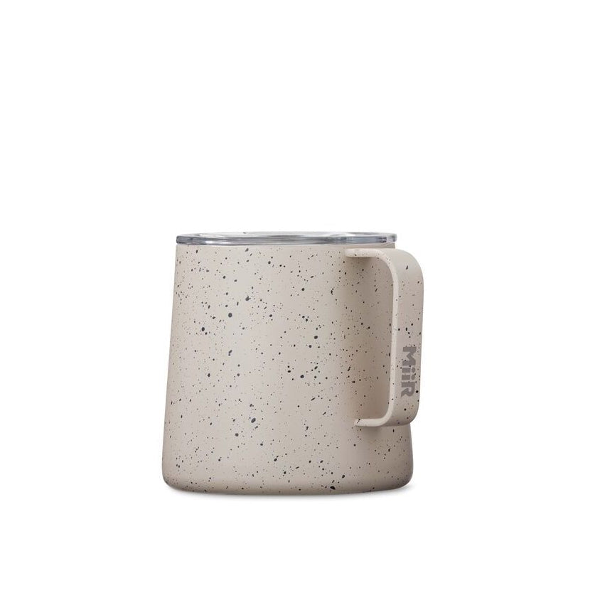 grounded-camp-cup-o6 Web_PDP-12oz_Grounded_Camp_Cup_Desert_Tan_Speckle_Studio_GCUSL1SV12224__Front_1.jpg